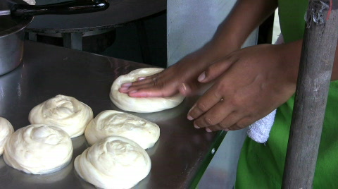 Flattening Roti Bread Dough
