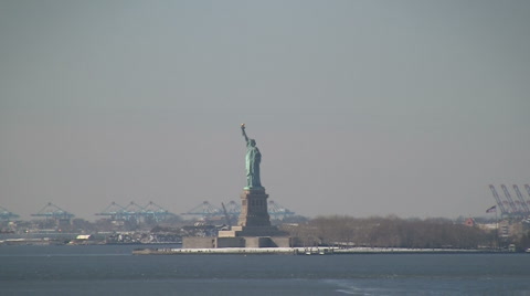 Sightseeing Helicopter Flies Near The Statue Of Liberty