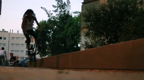 Bmx Biker Grinding And Throwing Sparks