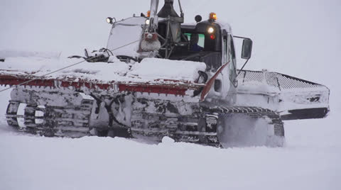 Snowcat Working On Ski Slope