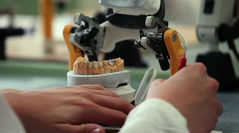 Student Dentist Repairs Teeth