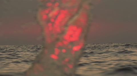 Sea Splashing At Sunset