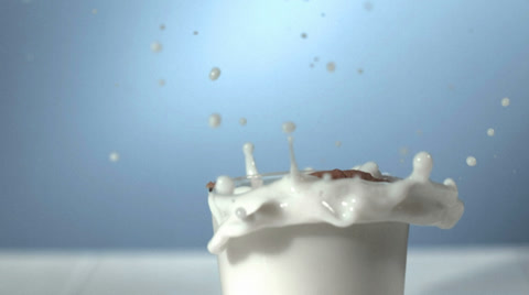 Cookie Splashing Into Milk, Slow Motion