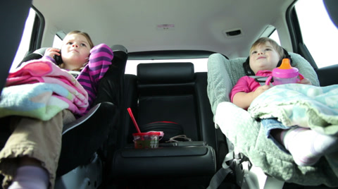 Two Young Girls Inside Car