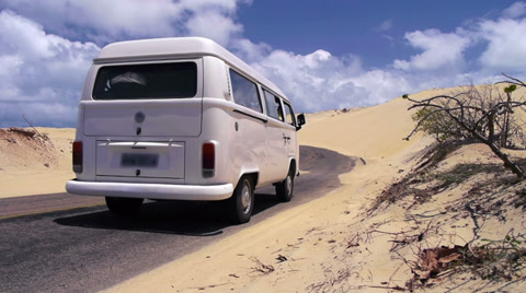 Hippie Van Driving Through The Desert