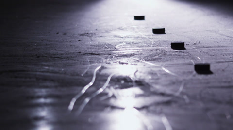 Team Sport - Ice Hockey - Pucks Lined Up