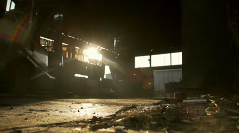 Forklift Operator Moves Into An Old Factory
