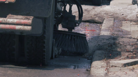 Municipal Street Sweeper Cleaning Streets After Winter - Slow Motion