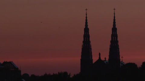 Haunted Church - Sunrise Behind The Spires Of An Old Basilica