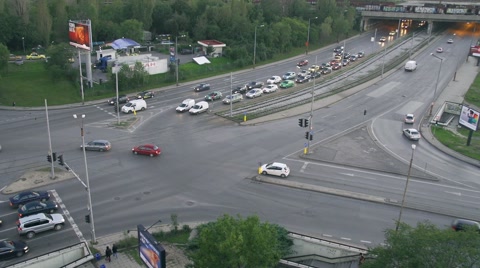 Crossroad In The City, Hurried Cars Day For Night