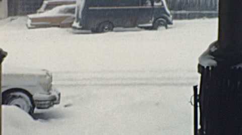 Usa - 1957: Snowing In The Street Of A Small Town