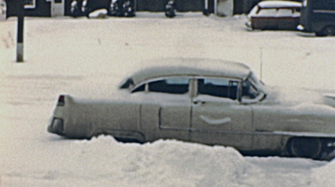 Usa - 1957: Snowing In The Street Of A Small Town