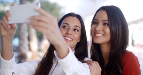 Gorgeous Stylish Young Women Pose For A Selfie