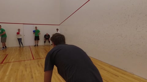 Group Throwing Dodgeballs At Opponent