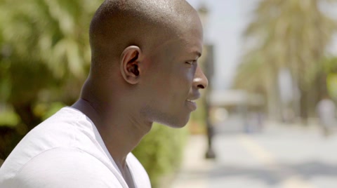 Close Up Side View Of Handsome Bald Black Man