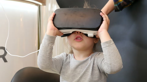 Little Child Kid Girl Watching Animation Film Through 3D Virtual Reality Glasses