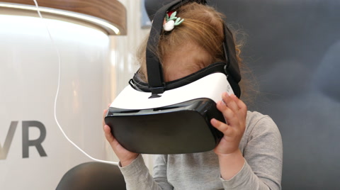 Little Child Kid Girl Watching Animation Film Through 3D Virtual Reality Glasses