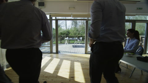 4K Business Team In A Meeting, Office With Outdoor Area Set In Natural Landscape