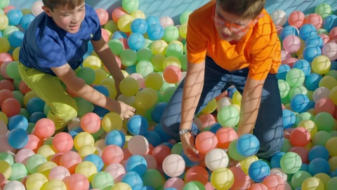 Kids Playing In A Pool Ball